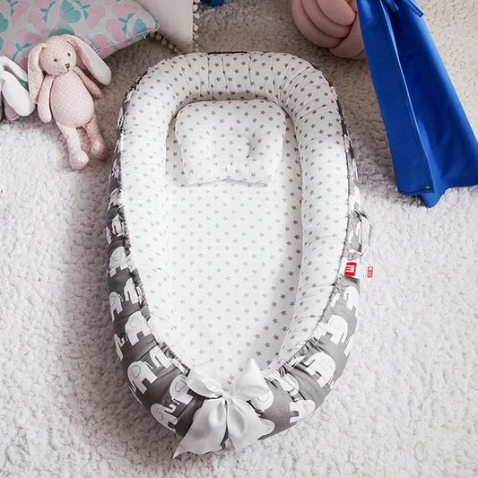 Réducteur de lit bébé | Cocon Maternel